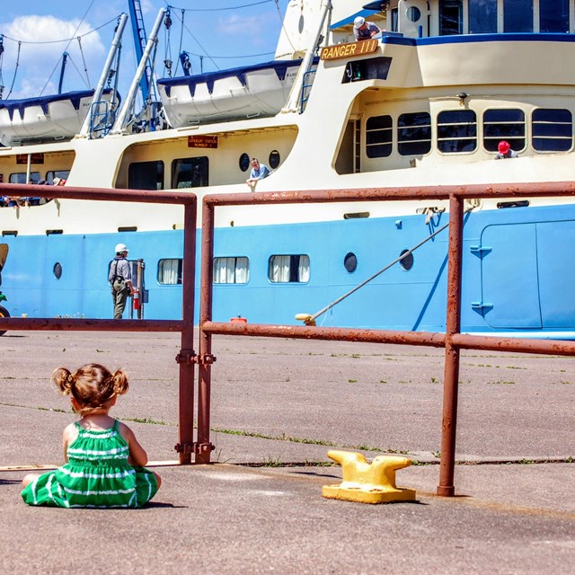 child staring intently at the Ranger III