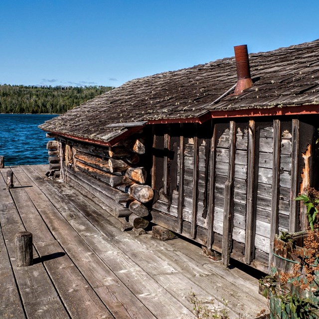 side perspective of a fishhouse, overlooking the Rock Harbor channel