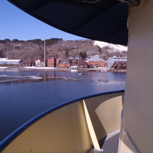 Quincy Smelter as seen from the Ranger III across the Keweenaw Waterway in Spring with snow and ice.