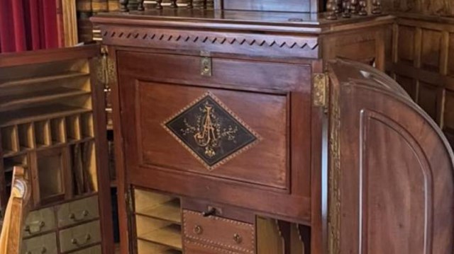 The Wooten Desk with drawers, shelves and a pull down writing surface.