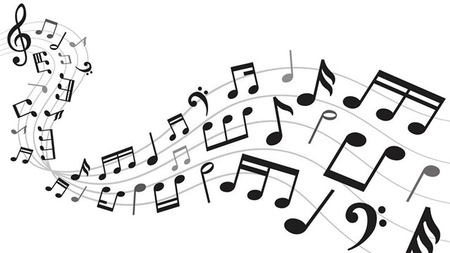 musical notes floating in a curved wave