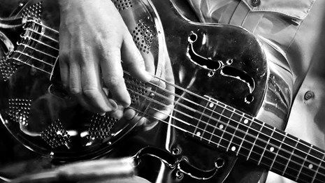 Closeup of trumpet player's hands and instrument
