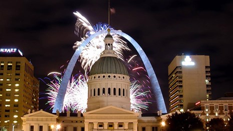 fireworks behind the Gateway Arch and Old Courthouse