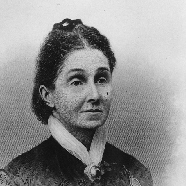 an engraving of a woman in a high necked dress 