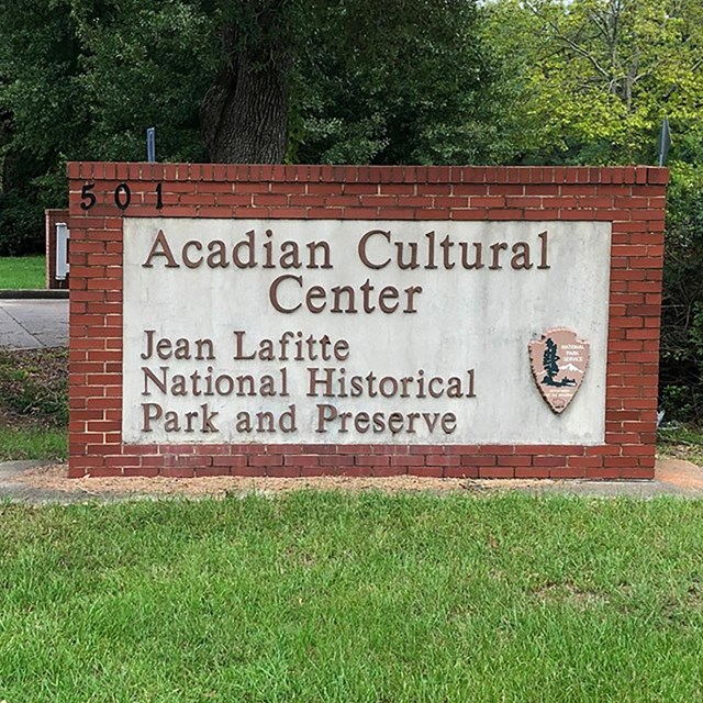 The entrance sign to the Acadian Cultural Center