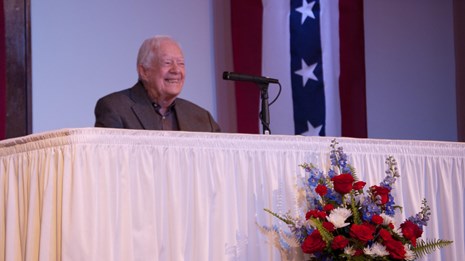 President Carter speaking to the assembled audience on Presidents' Day