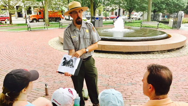 Ranger speaking to tour group.