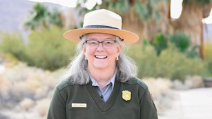 Park Ranger smiling towards the camera