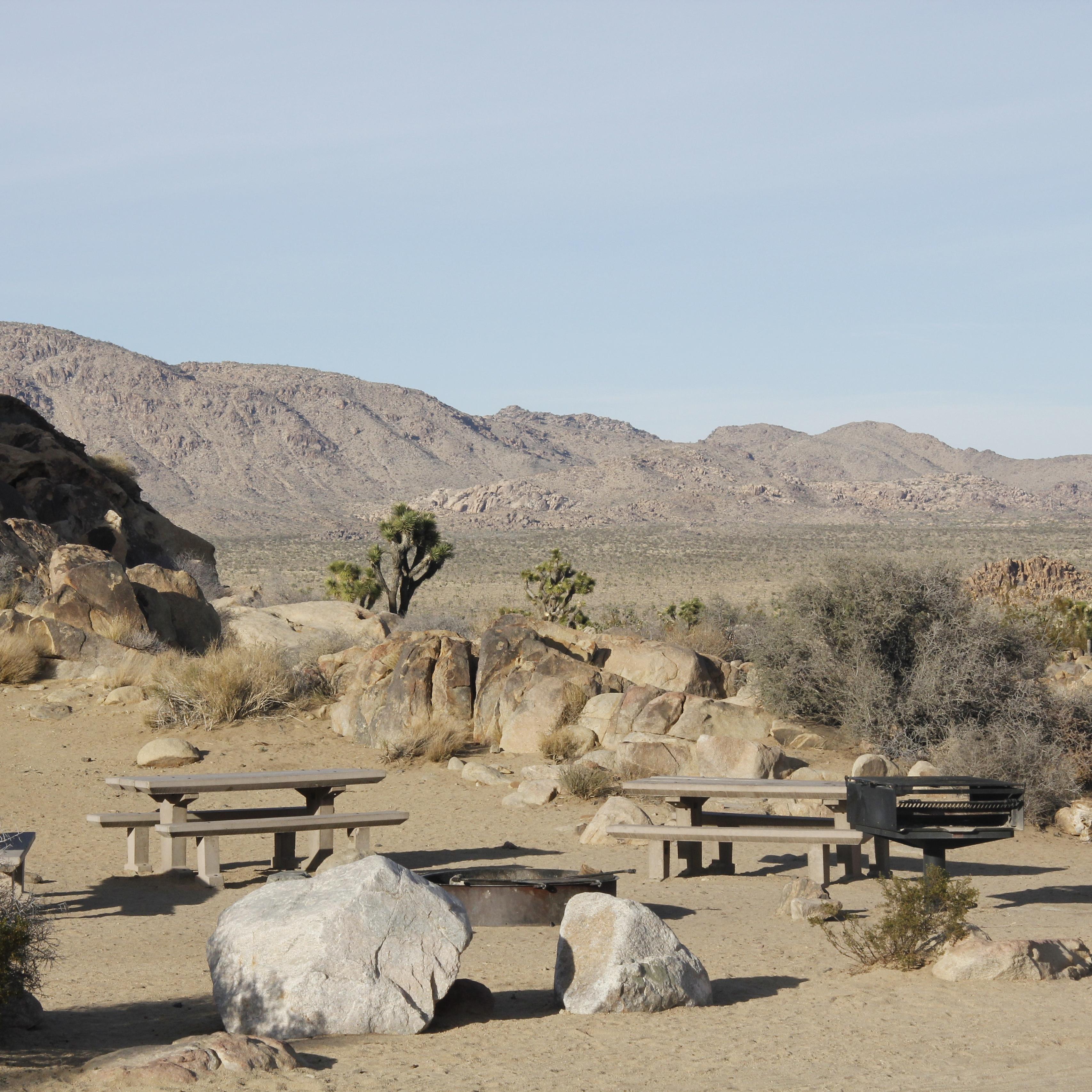 Campsite with rocks and desert landscape