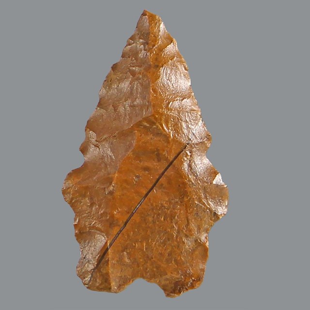 an arrowhead made of stone