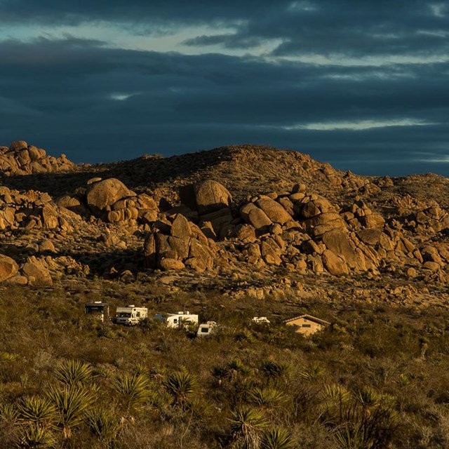 desert landscape with RVs and tents at Cottonwood Campground visible in the distance