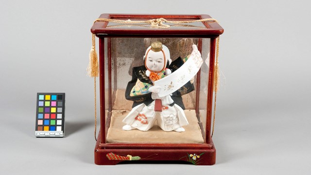 doll in case. 