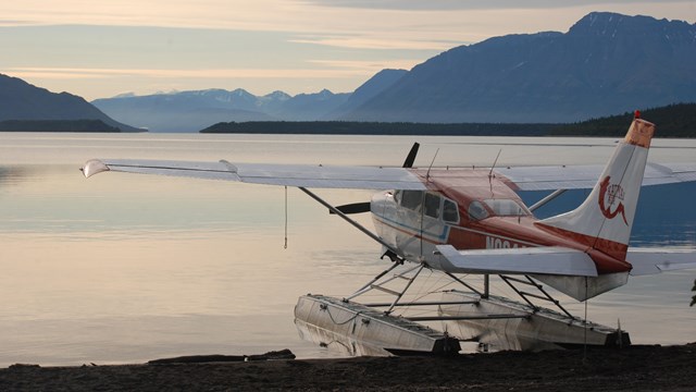 floatplane parked along lakeshore
