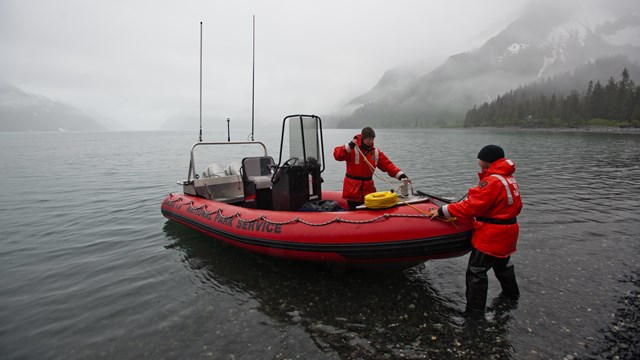 Two people on an inflatable boat