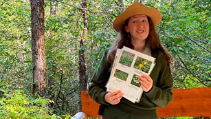 Park Ranger holding a wildflower identification she