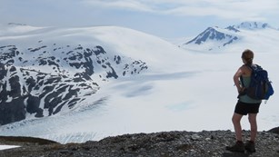 Woman looking over the Harding Icefield