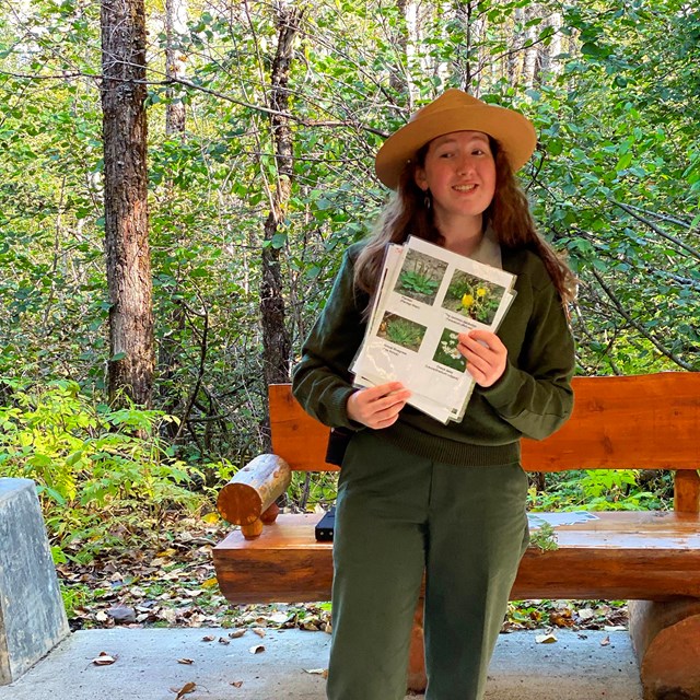 Park Ranger holding a wildflower identification sheet.