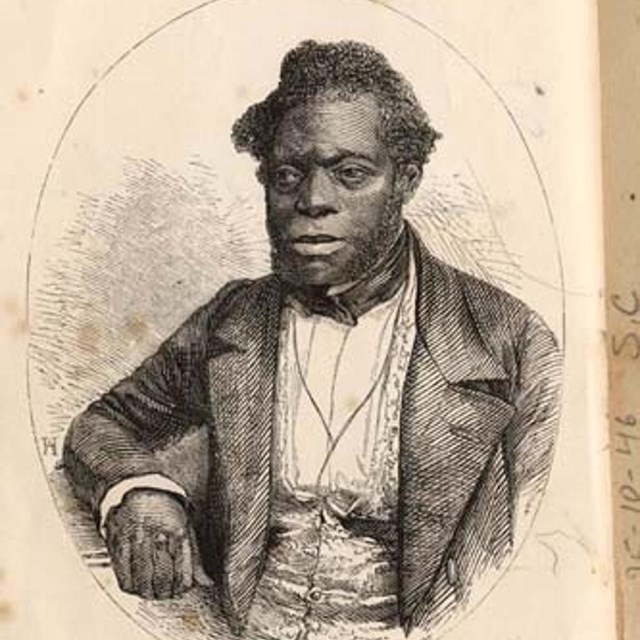 A historic portrait of a man with dark skin and d