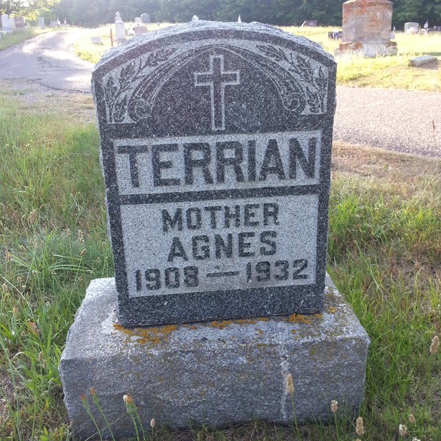 A grave marker that reads 