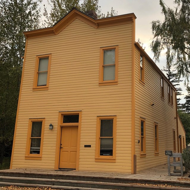 A large, bright yellow building