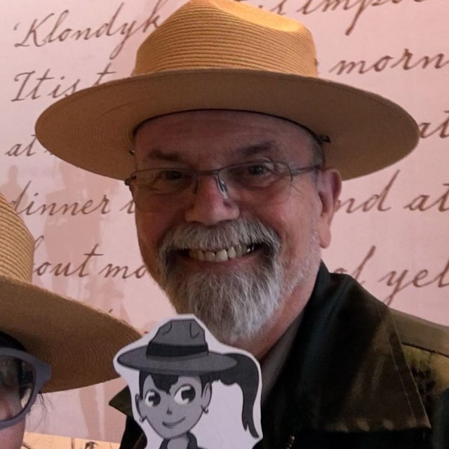 Rangers within a visitor center