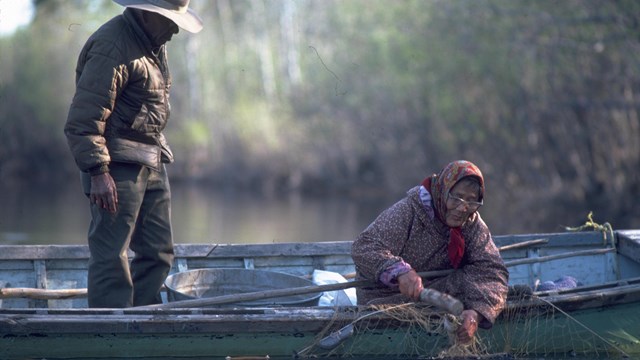 Two Inupiat Elders fishing along the river