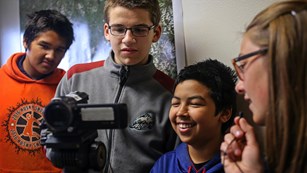 Student interviewing a park biologist