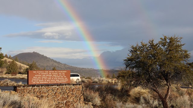 Rainbow over the visitor center parking lot.