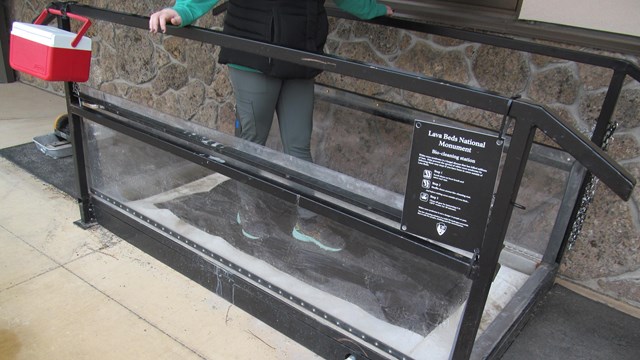 Person walking on the cleaning station