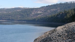 A look at the river from a rocky shore.