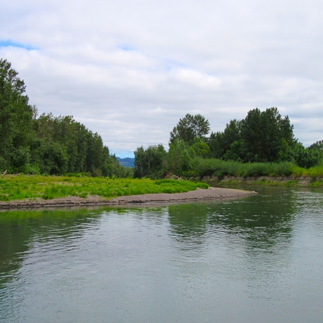 Waterway with white clouds