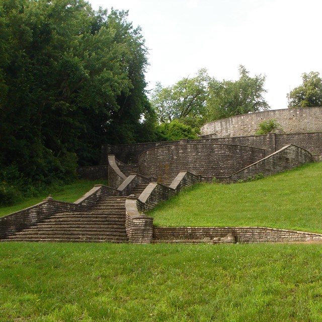 Stone stairs on grassy hill