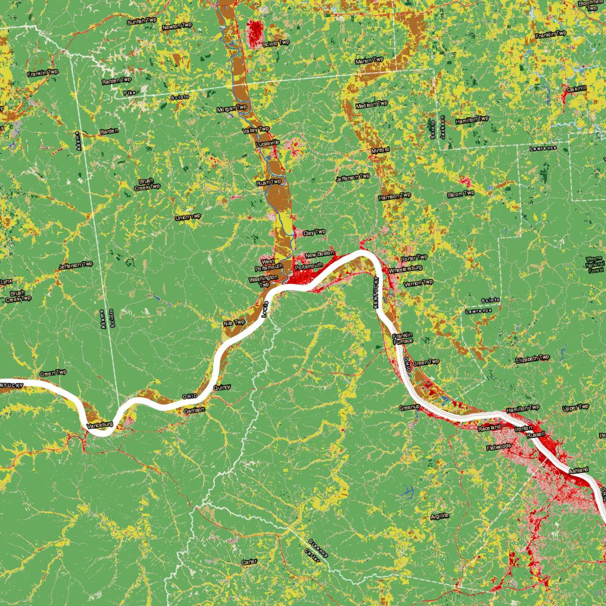 scientific map with bright patchwork of green and other colors indicating unknown variables.
