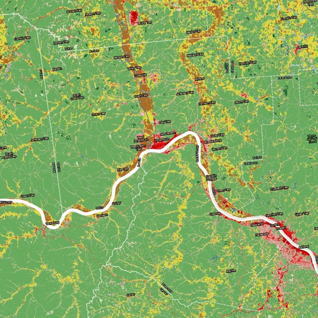 scientific map with bright patchwork of green and other colors indicating unknown variables.