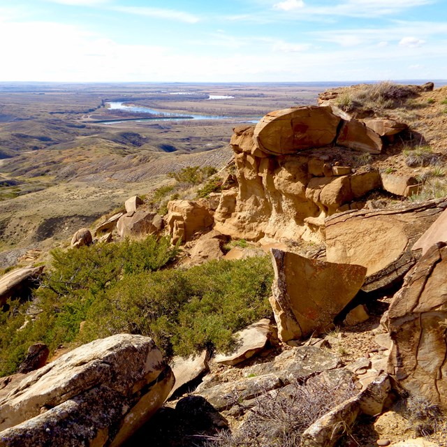 Yellow cliffs with river in the distance