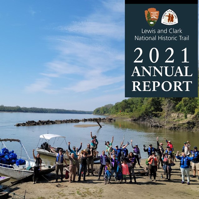 Report cover. Photo of group standing on a riverbank with small boats.