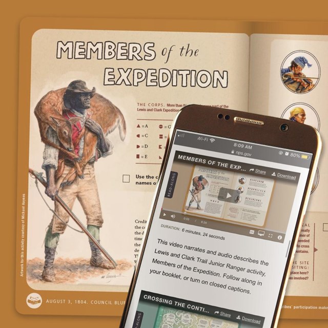Activity page with historical figure. A cell phone shows a video version of the printed page.