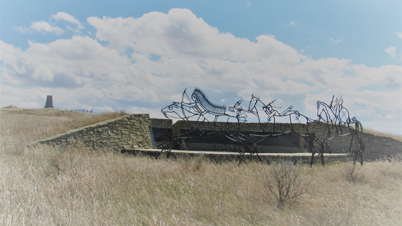  A photograph of Indian Memorial and Last Stand Hill on the background