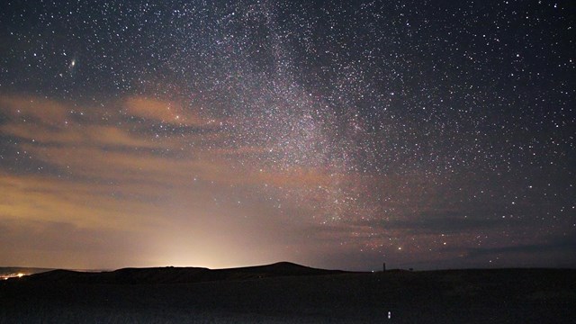 The milky way stretches out over the Reno-Benteen defense site. 
