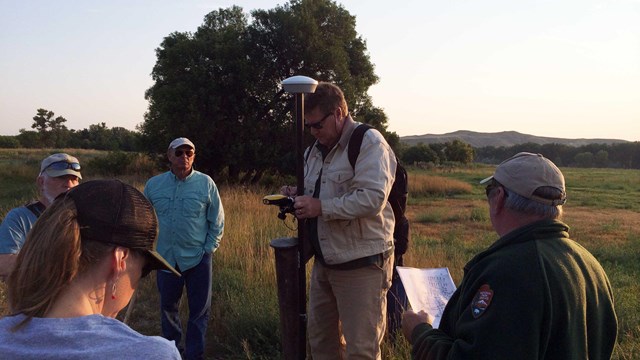 Collecting scientific data at Little Bighorn Battlefield.