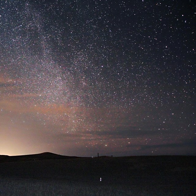 The milky way stretches out over the Reno-Benteen defense site. 
