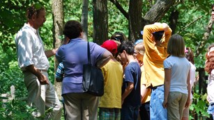 School group meeting ranger at the Living Historical Farm.