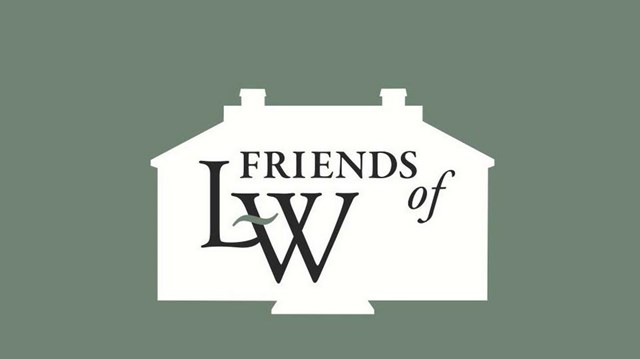 logo of white house outline on green with large L-W