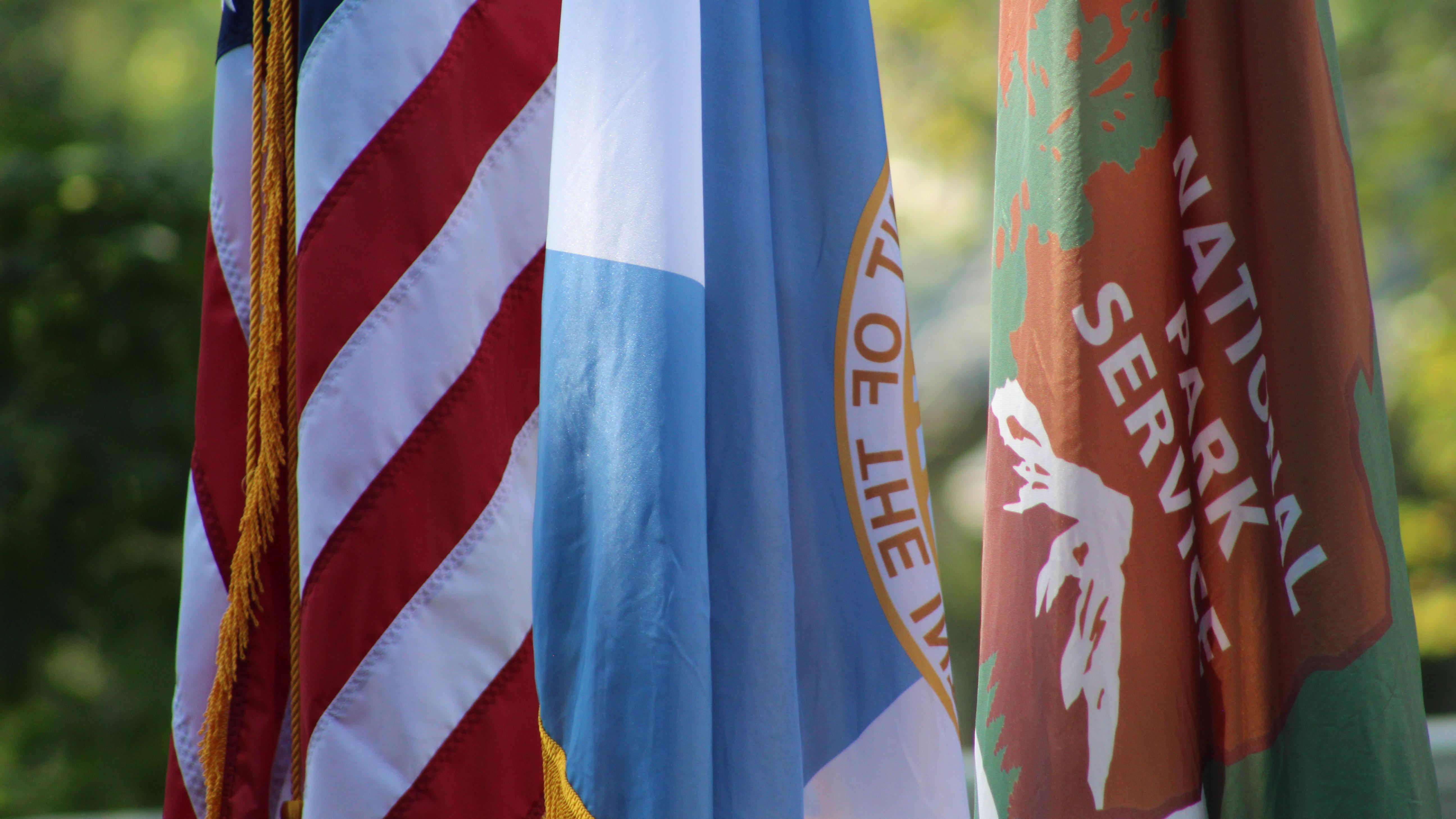 Flags of United States, Department of the Interior, and National Park Service on flagpoles