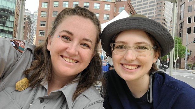 A ranger and intern pose for a selfie