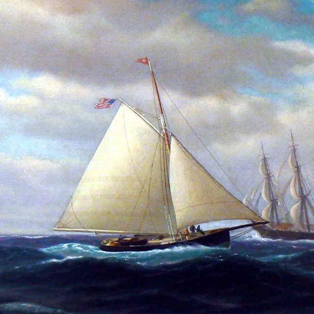 Painting of yacht with sails on ocean