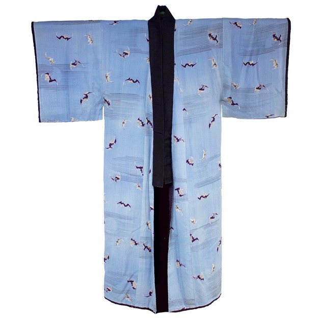 Light blue kimono decorated with flying bats, with dark blue at center