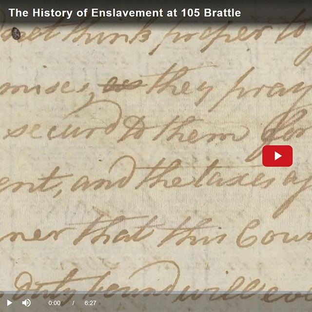 Screenshot of video, featuring a closeup of an 18th century handwritten petition.