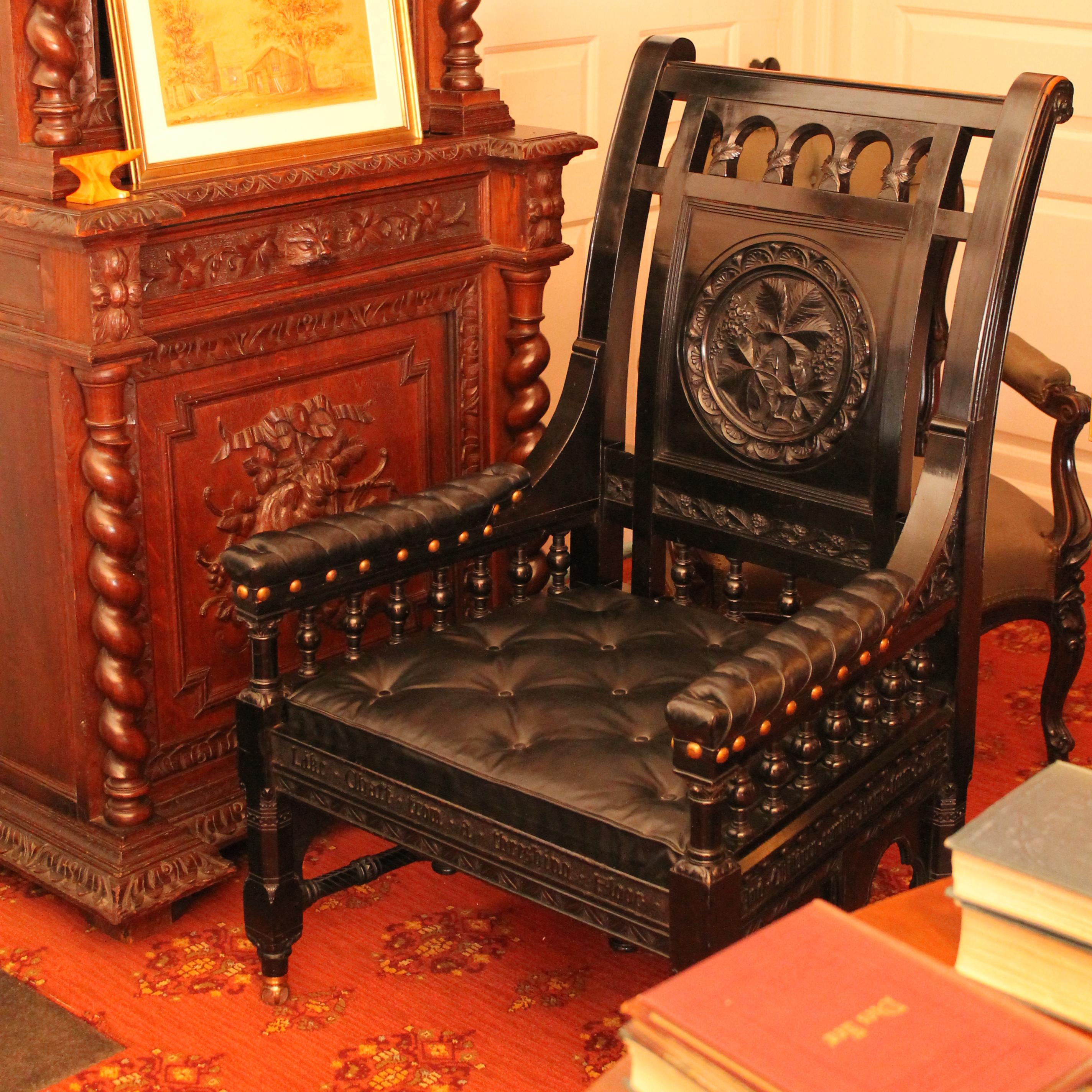 Chair bearing inscriptions from The Village Blacksmith