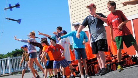 Summer campers test gliders they designed